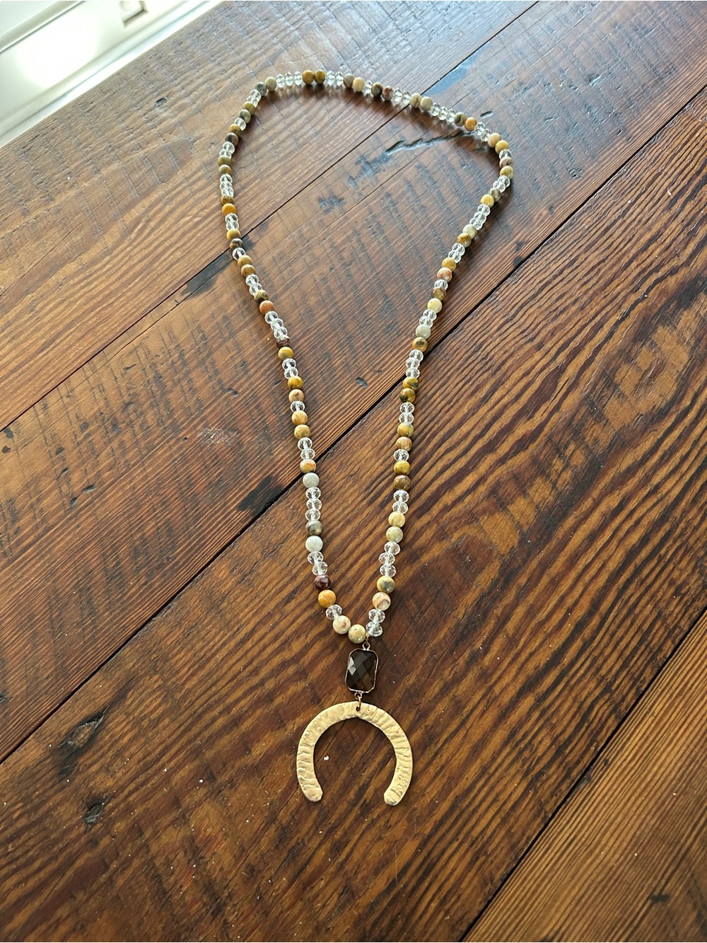 Beaded Brown and Gold Crescent Pendant Necklace